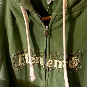 As small element zippered swater